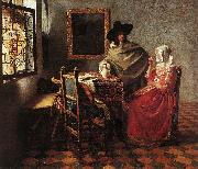 Jan Vermeer Lady Drinking and a Gentleman oil painting